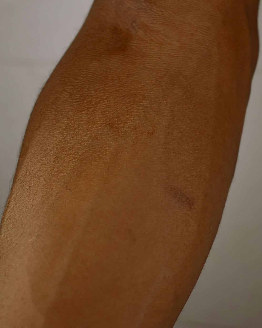 brown textile on white textile