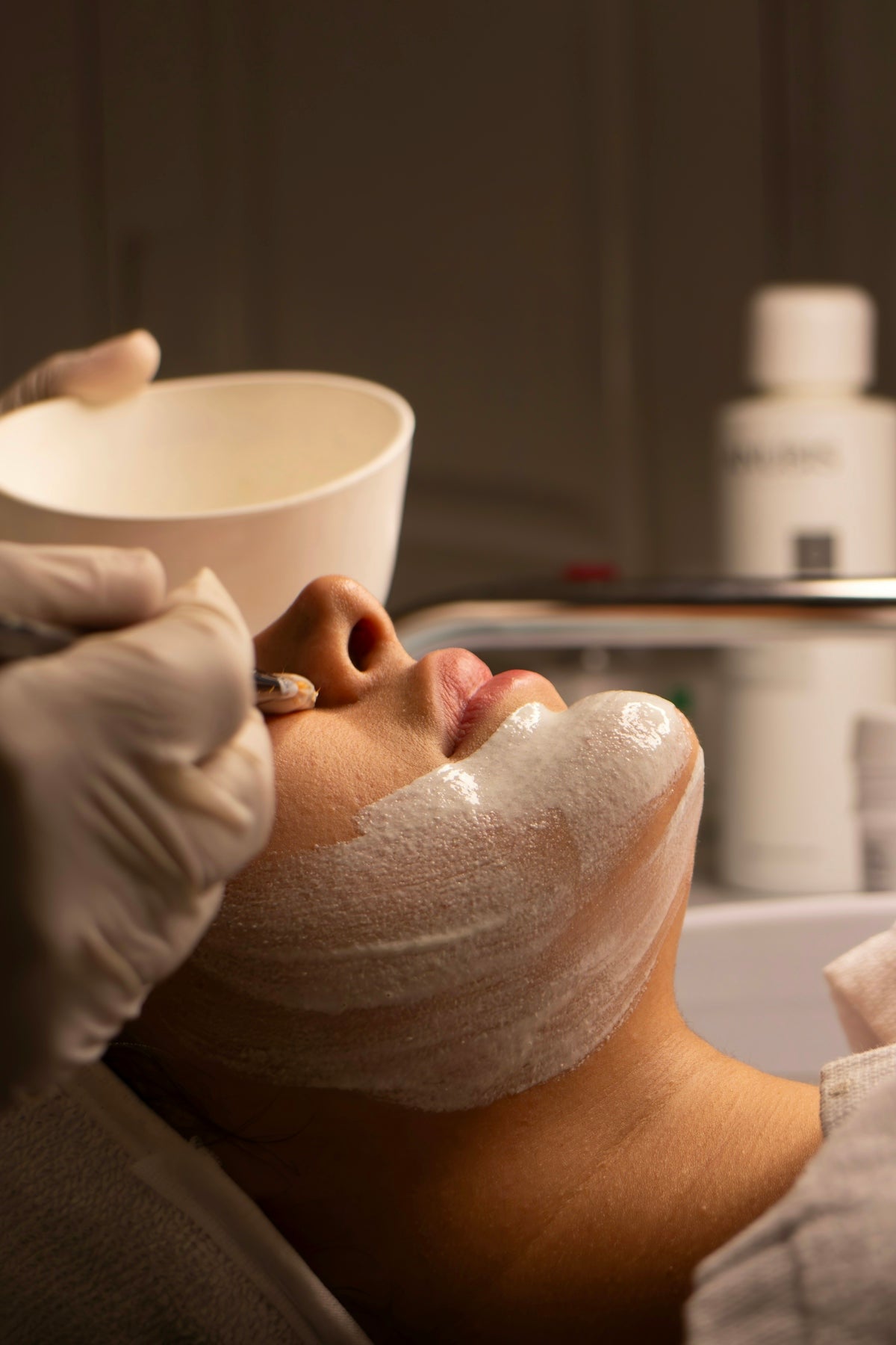 A person receiving a facial treatment.