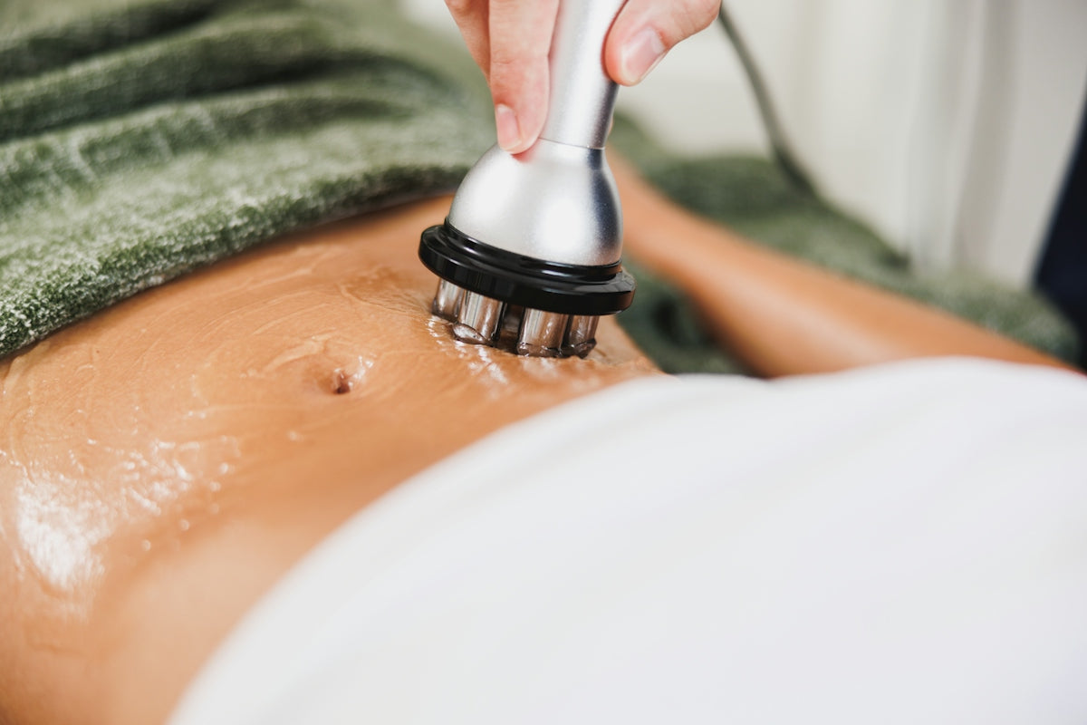 Abdomen treatment with a device and cream